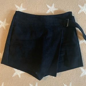 Super cute black suede skort with buckle detail